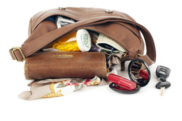 purse open with contents spilling out